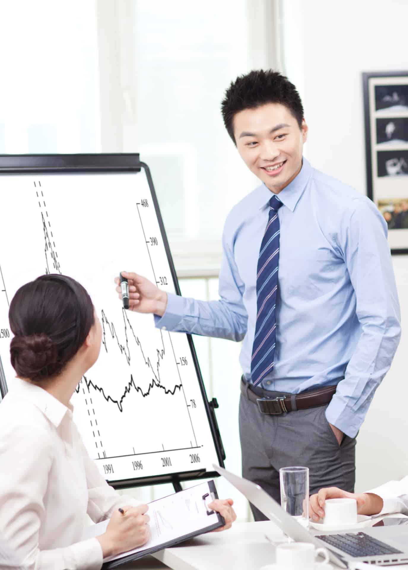 Reduce Costs with a Reconciliation Solutions, Asian man with graph flowchart